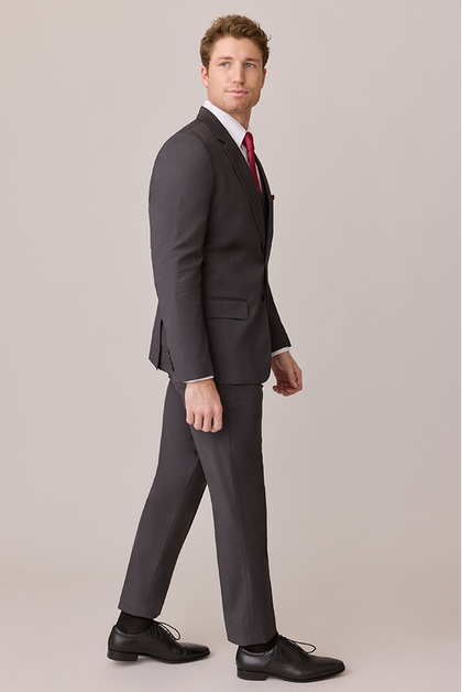 Model: Ethan; Size: Modern 32/31. Pictured with Berry Satin Tie & Pocket Square