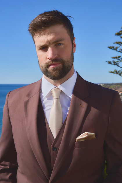 Model: Caleb; Size: Slim 48 Tall. Pictured with Soft Champagne Satin Tie and Pocket Square