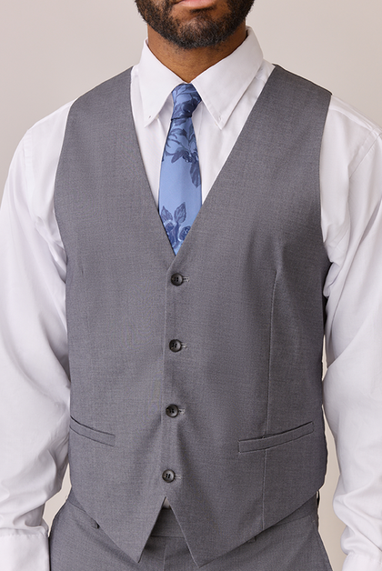 Model: Colin; Size: M. Pictured with Indie Blue Bouquet Floral Print Satin Tie