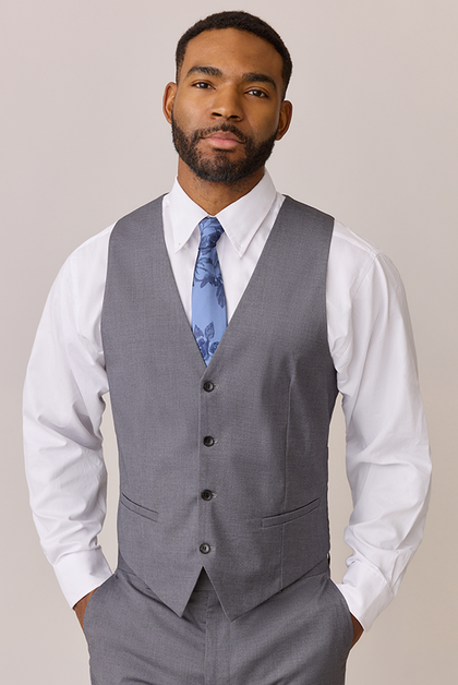 Model: Colin; Size: M. Pictured with Indie Blue Bouquet Floral Print Satin Tie