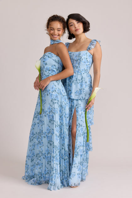 Saylor Chiffon Pleated Floral Print Dress (L), Poppy Chiffon Floral Print Dress (R) in Sky Blue Blossom